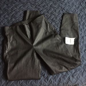 Zara stitched panel faux leather pants. M. Zippers